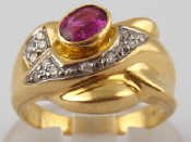 Appraisal: A yellow metal tests carat gold ruby and diamond ring