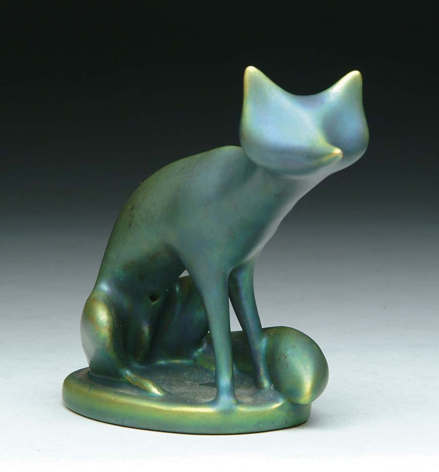 Appraisal: ZSOLNAY FOX Stylized figure of a fox is finished in