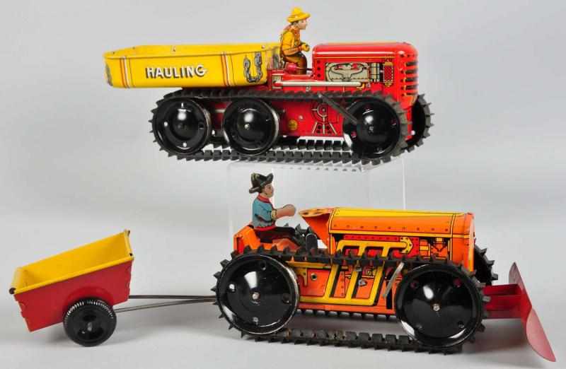 Appraisal: Lot of Tin Litho Marx Tractor Wind-Up Toys Description American