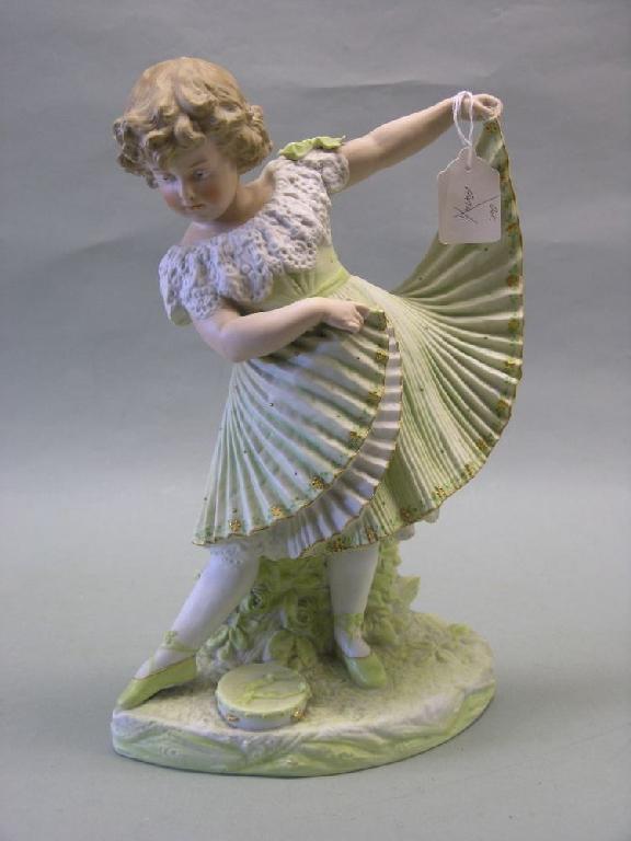 Appraisal: A late th century bisque porcelain figure of a dancing