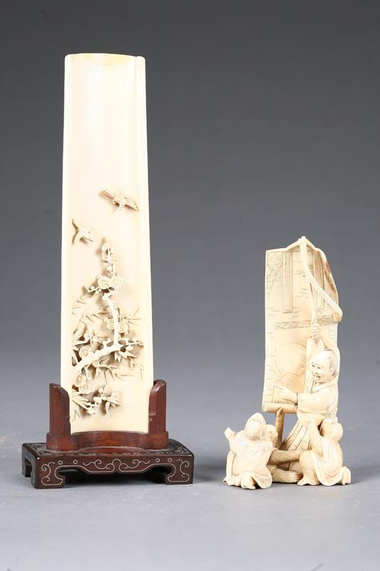 Appraisal: TWO IVORY CARVINGS Late th-early th century Chinese plaque with