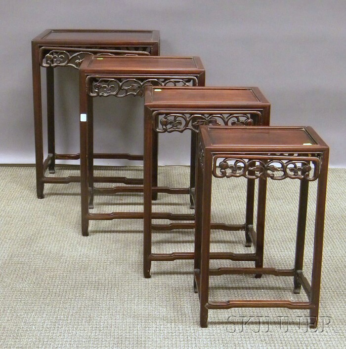 Appraisal: Nest of Four Asian Carved Rosewood Stands top stand ht