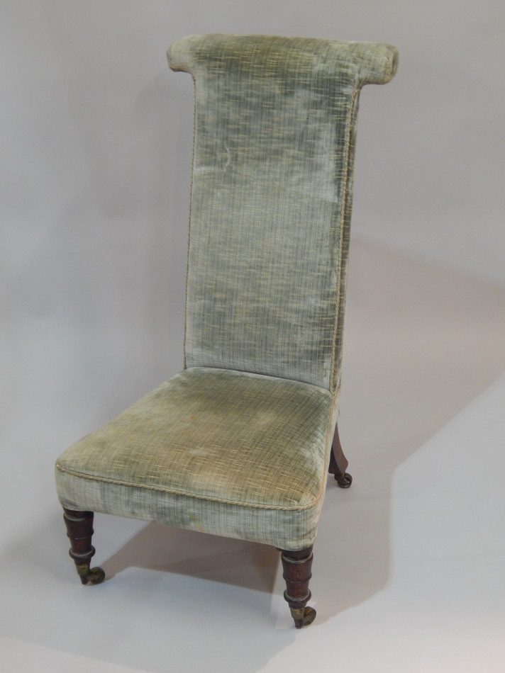 Appraisal: A Victorian beech chair with padded back on turned legs