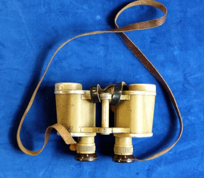 Appraisal: Second world war German army binoculars sand colour and marked