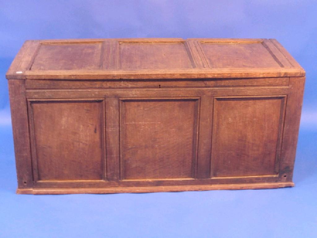 Appraisal: An oak three panelled coffer cm wide