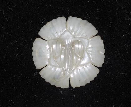 Appraisal: Chinese white-celadon jade hair pin th century Of circular foliate