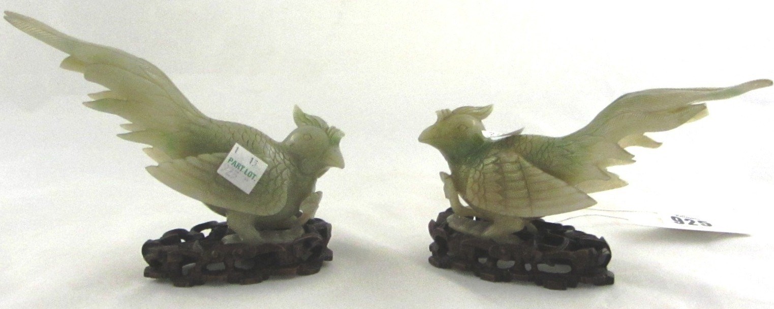 Appraisal: A pair of Chinese jadeite models of phoenixes th century