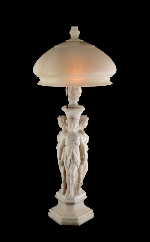 Appraisal: GRACES CARVED ALABASTER LAMP Carved base with figures of the