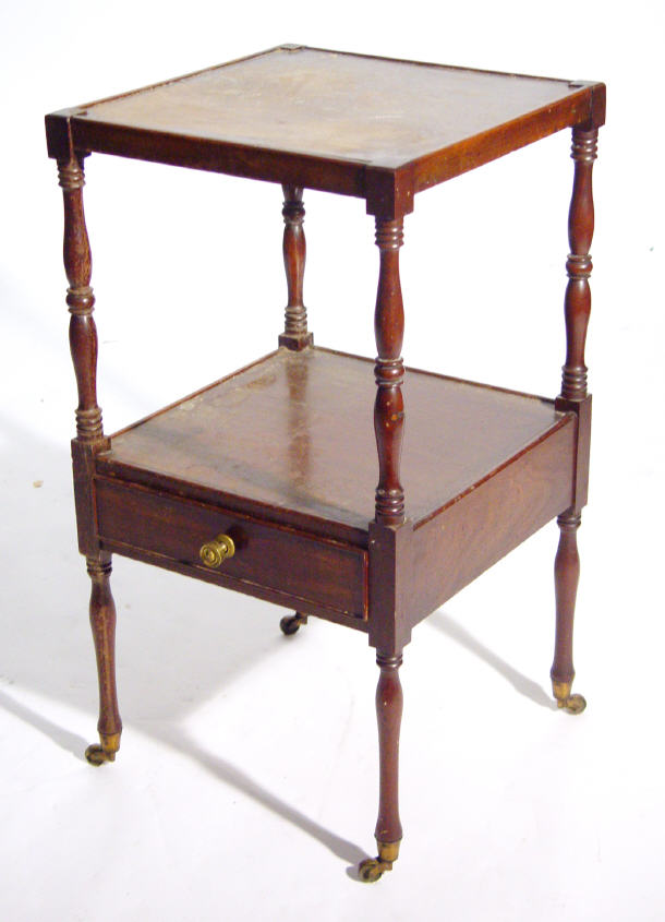 Appraisal: Georgian mahogany two tier night stand fitted a frieze drawer