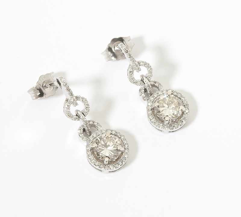 Appraisal: A pair of diamond and white gold pendant earrings K