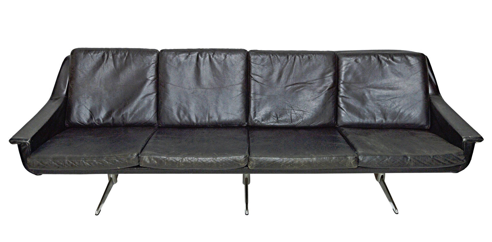 Appraisal: th century design a black leather upholstered sofa on three