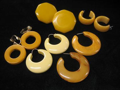 Appraisal: Group of five pair of yellow bakelite earrings Of various