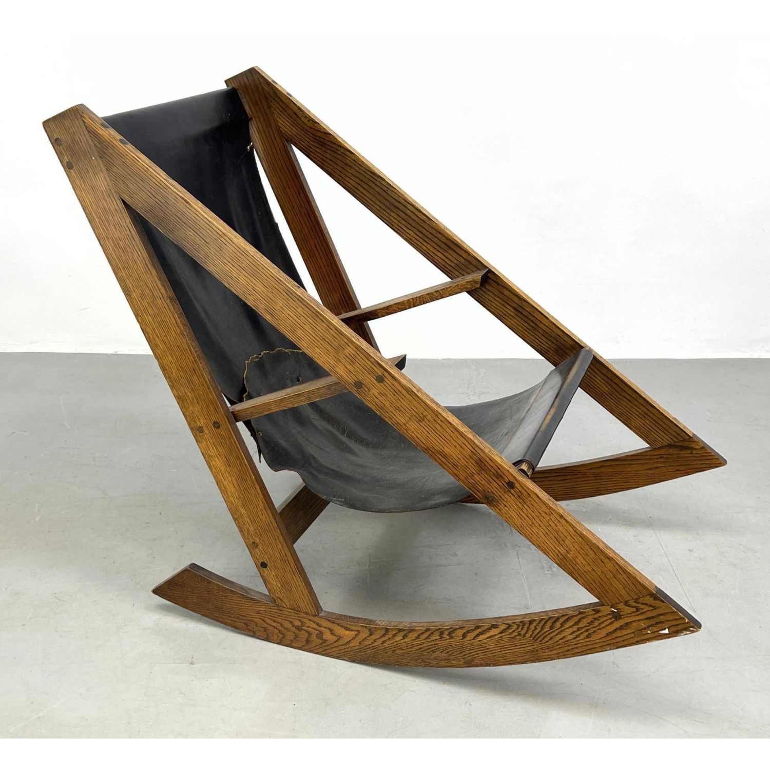 Appraisal: Oak Compass Form Frame Modernist Rocking Chair Black leather sling