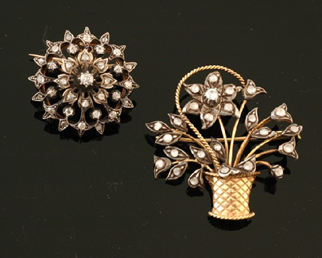 Appraisal: An Antique diamond pendant brooch and a diamond flower brooch