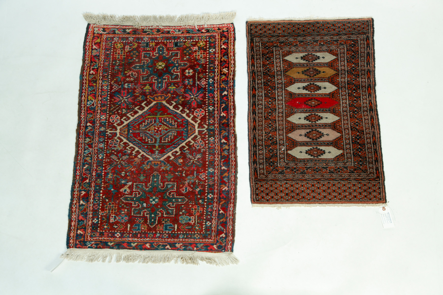 Appraisal: TWO HANDMADE ORIENTAL THROW RUGS Asian rd quarter th century