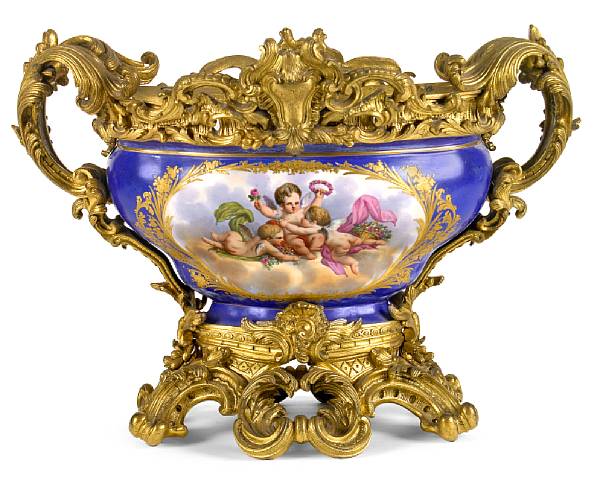 Appraisal: A Louis XV style gilt bronze mounted porcelain centerpiece late