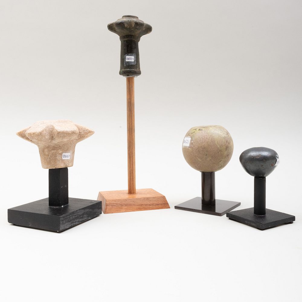 Appraisal: Group of Four Mace Heads Comprising One Bronze Mace Head