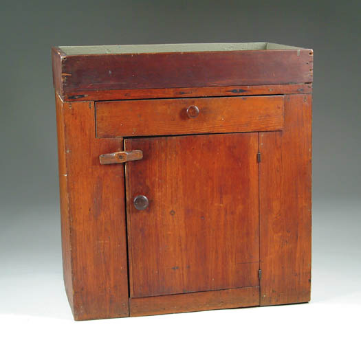 Appraisal: SMALL ANTIQUE DRY SINK The open rectangular top having one