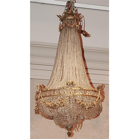 Appraisal: Louis XVI Style Gilt-Metal and Beaded Glass Eight-Light Chandelier Estimate