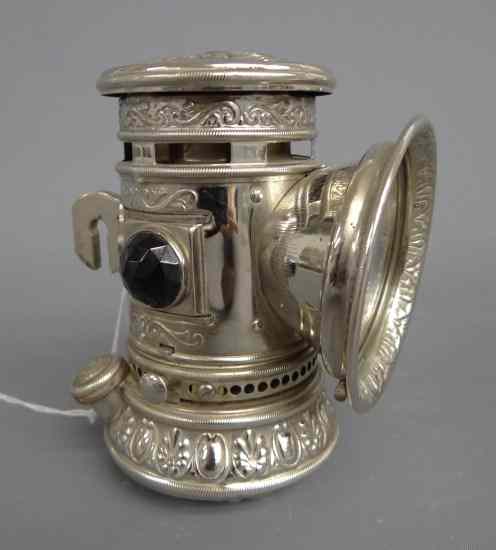 Appraisal: Bicycle oil lamp ''SEARCH light'' fancy model VG cond