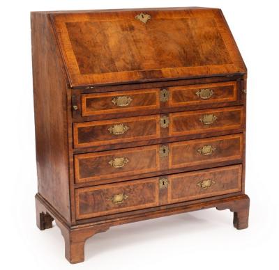 Appraisal: A George I walnut and feather banded and crossbanded bureau