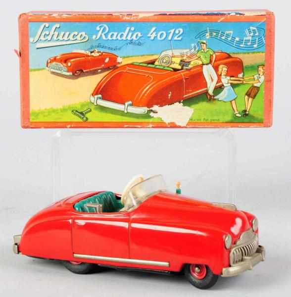 Appraisal: Tin Litho Schuco No Radio Auto Wind-Up Toy German Working