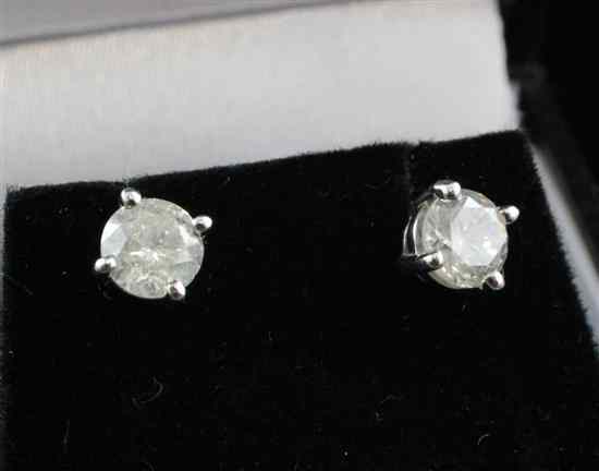 Appraisal: A pair of ct white gold solitaire diamond ear studs