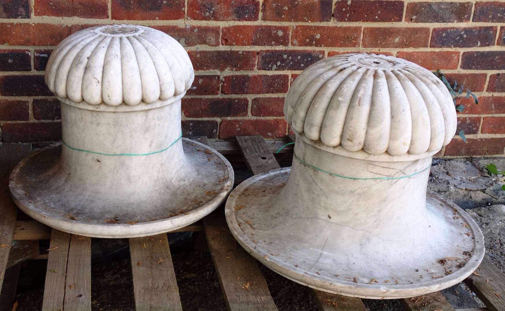 Appraisal: A pair of th century marble urn bodies with floral