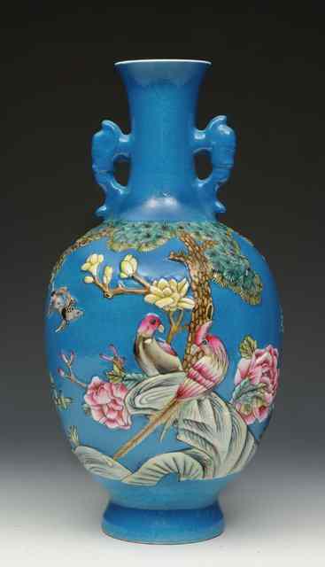 Appraisal: A CHINESE TURQUOISE GROUND PORCELAIN BALUSTER VASE with raised polychrome