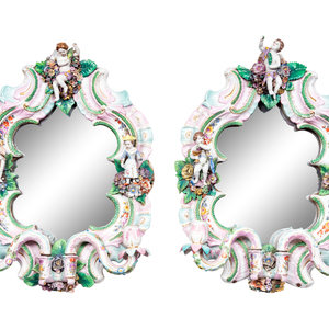 Appraisal: A Pair of Continental Porcelain Girandole Mirrors th Century Height