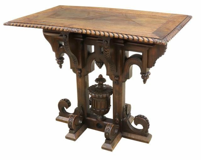 Appraisal: French carved walnut table th c rectangular top with molded