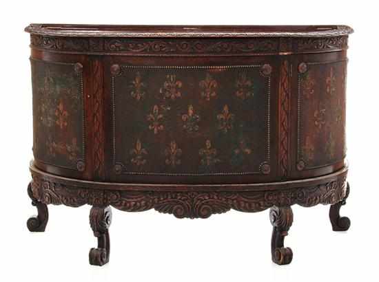 Appraisal: French carved oak and decorated leather panel wine cooler late