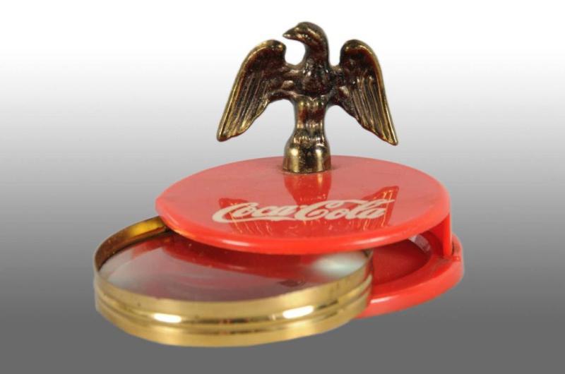 Appraisal: Plastic Coca-Cola Desk Paperweight Description s Very unusual Includes attached