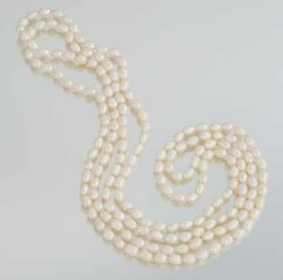 Appraisal: A Long Strand of Oval Freshwater Pearls A continuous strand