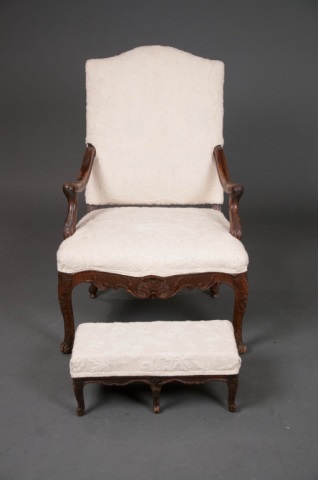 Appraisal: Ca Arm Chair and Footstool Carved arms and knees with