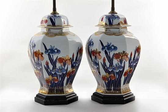 Appraisal: Pair porcelain covered urns converted to lamps paneled vasiform decorated