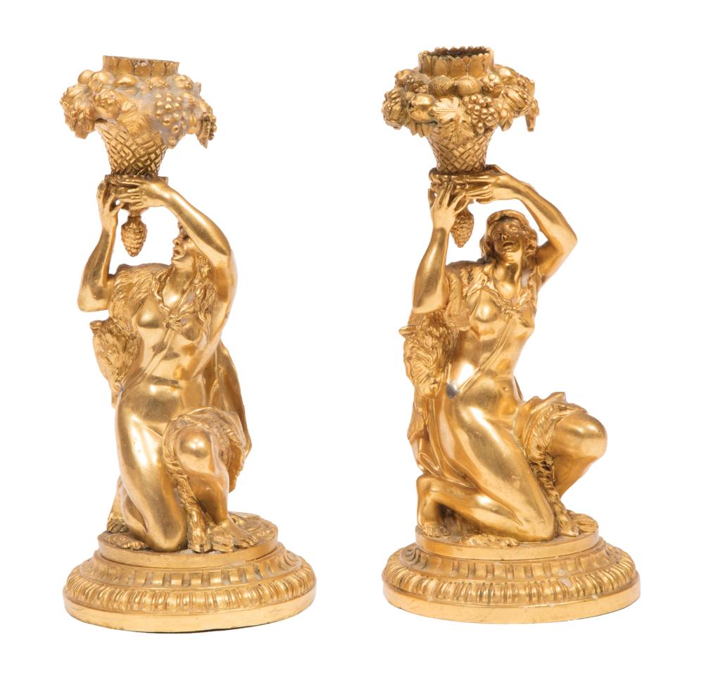 Appraisal: Pair of Antique French Gilt Bronze Figural Candlesticks each draped