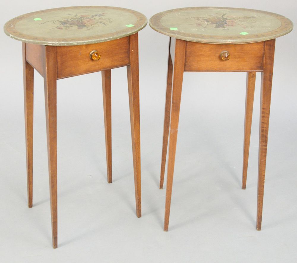 Appraisal: Pair of contemporary oval stands with paint decorated lift tops