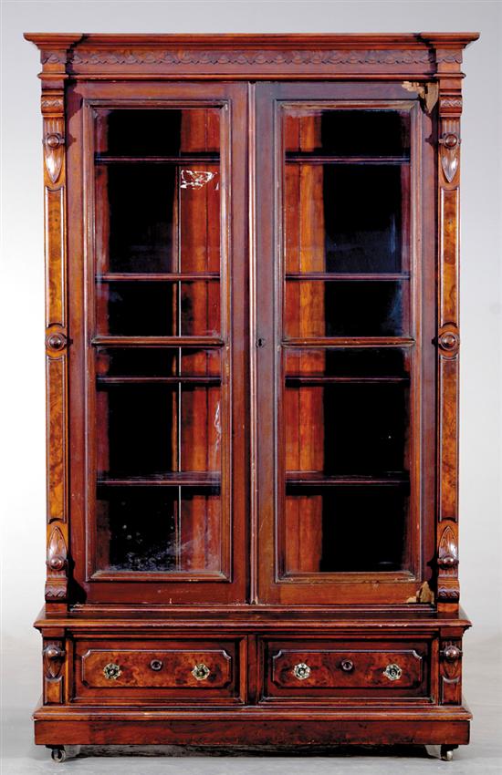 Appraisal: Eastlake Victorian carved walnut bookcase circa stepped and molded cornice