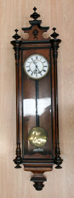 Appraisal: An Austrian walnut regulator late th century cm high