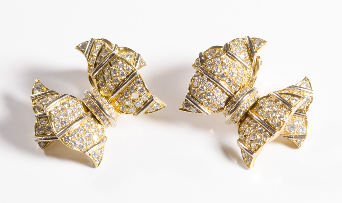 Appraisal: PAIR OF DIAMOND CLIP-ON EARRINGS each k yellow gold bows