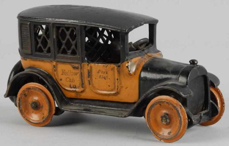 Appraisal: Cast Iron Arcade Yellow Cab Automobile Still Bank Description American