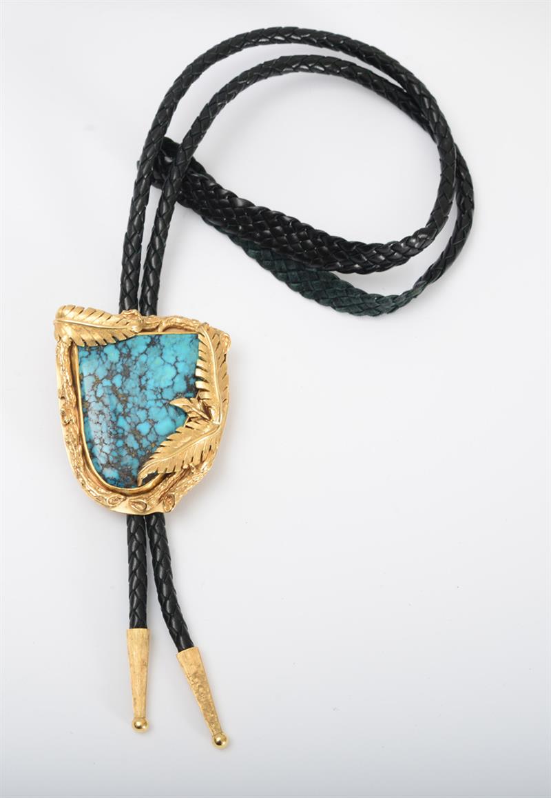 Appraisal: K GOLD AND TURQUOISE BOLO TIE Centering a turquoise hardstone