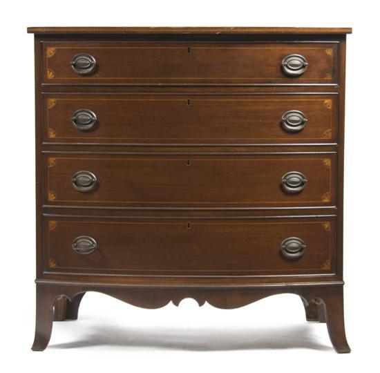 Appraisal: An American Chest of Drawers of bow front form with