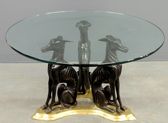 Appraisal: - Brass and metal coffee table with round glass top