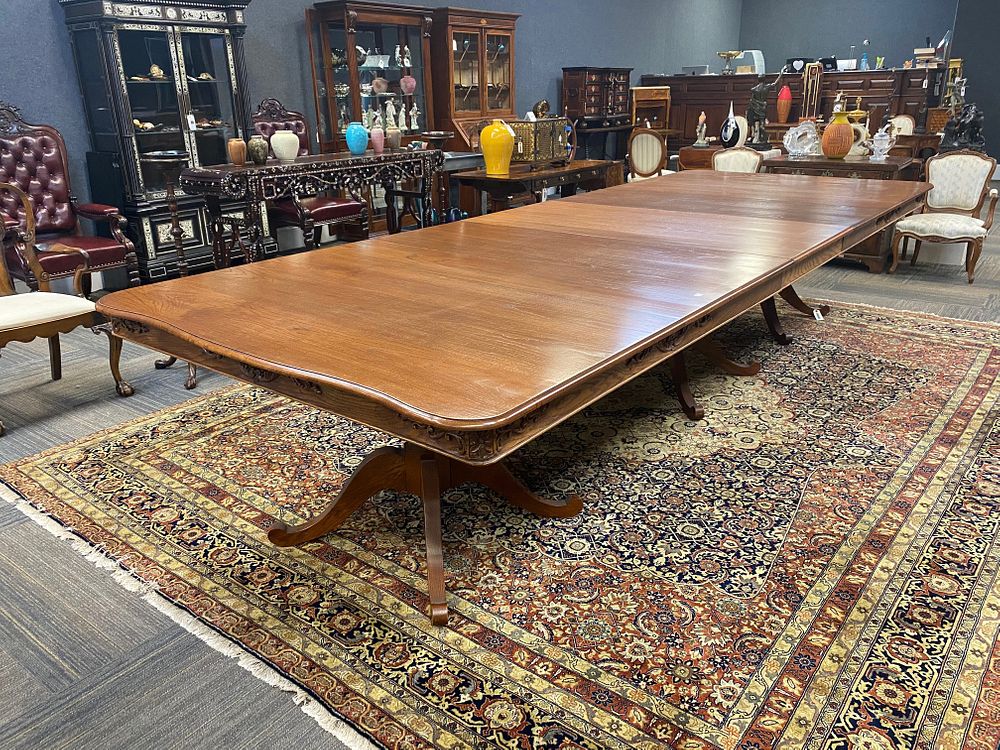 Appraisal: A LARGE AMERICAN THREE PEDESTAL STRIPED OAK EXTENSION DINING TABLE