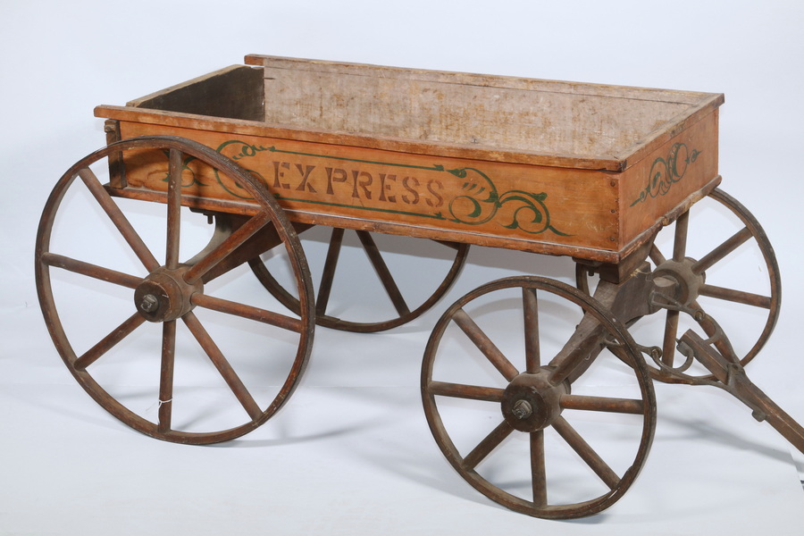 Appraisal: CHILD'S WAGON Late th c wooden express pull wagon Wooden