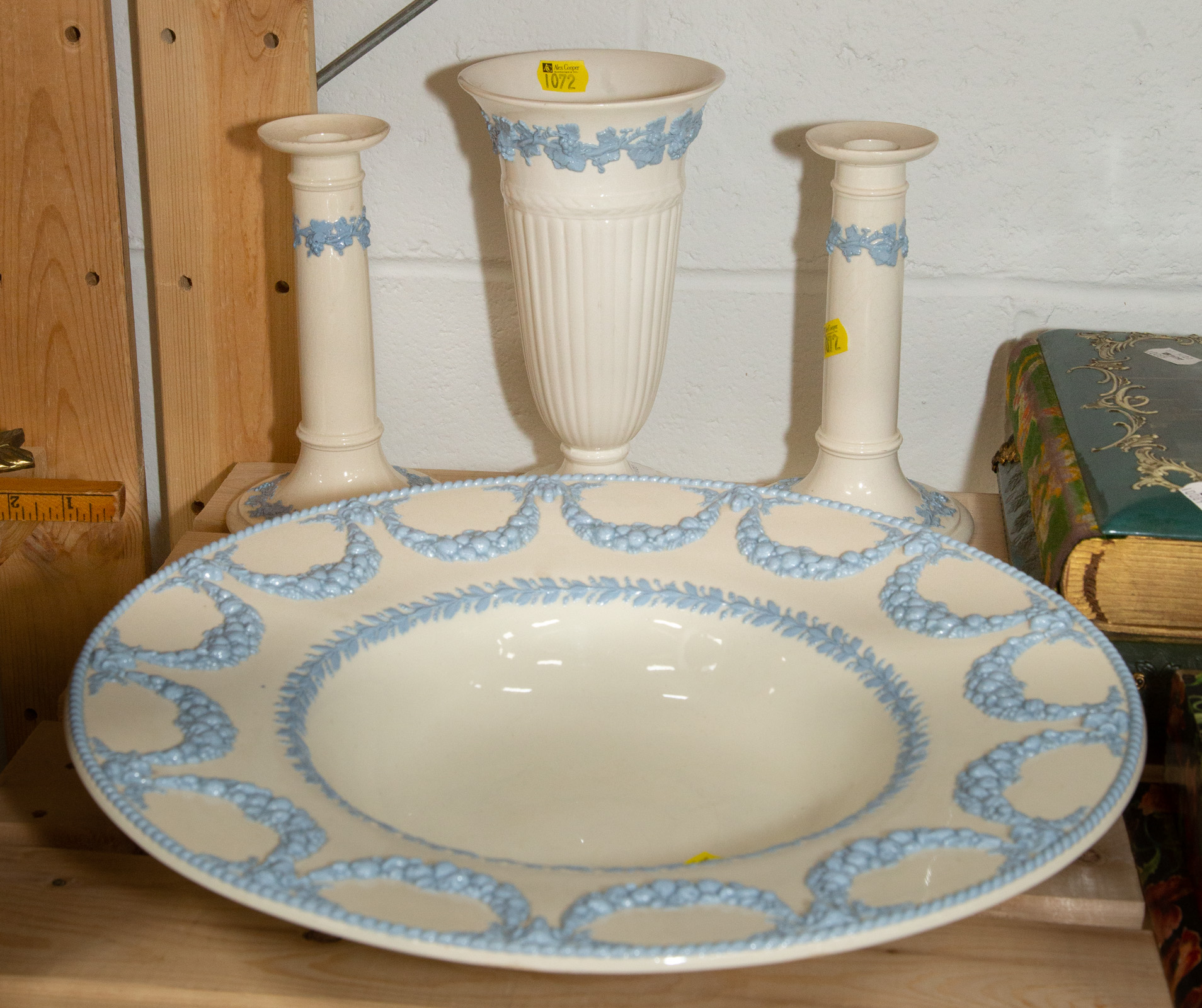 Appraisal: FOUR PIECES OF WEDGWOOD EMBOSSED QUEENSWARE Includes a pair of