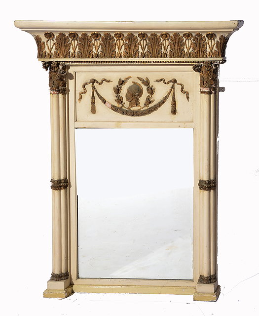 Appraisal: A CREAM PAINTED AND PARCEL GILT REGENCY RECTANGULAR WALL MIRROR