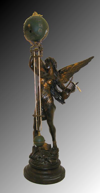 Appraisal: French patinated spelter mystery timepiece modelled as an angel holding